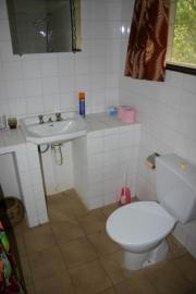 In-suite bathroom in Cameroon hunting camp chalet