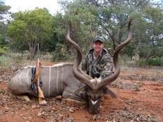 Hunter posind with trophy kudu