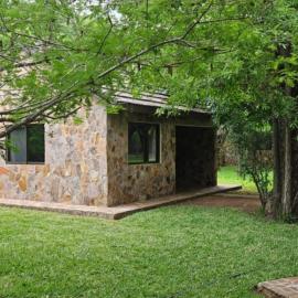 lion hunting lodge exterior