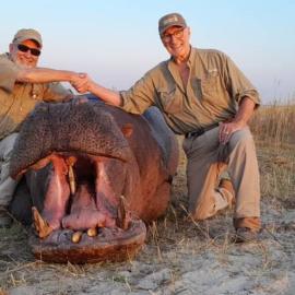 African big hippo hunt by boat