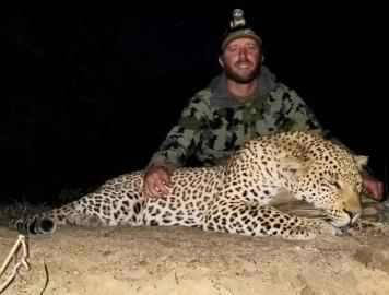 Hunter with leopard trophy in Zimbabwe