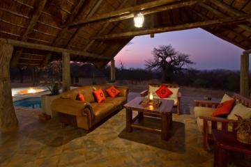 Seating area in bow hunting lodge in the evening