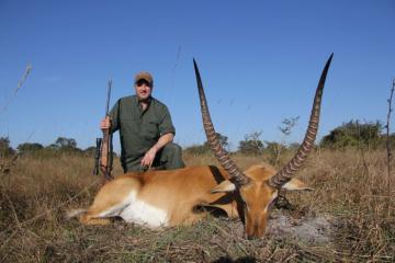 Posing with a trophy Kafue Lechwe