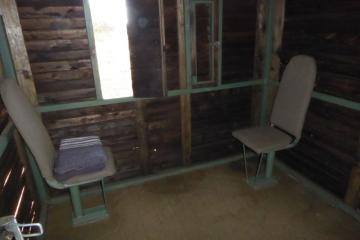 Inside of elevated bow hunting blind