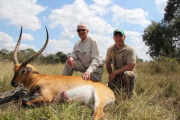 Two hunters posing with their Kafue Lechwe Trophy