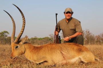 Proud Hunter with trophy Kafue Lechwe